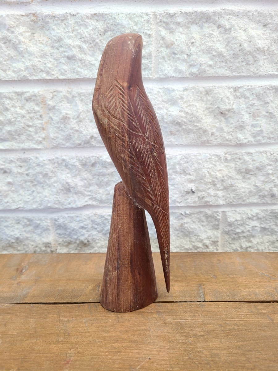 Oiseau en bois sculpture légèrement usée