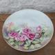 Assiette de mur en porcelaine fleurs roses et enfant2