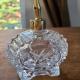 Flacon de parfum en cristal transparent et laiton57